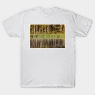 Forest reflecting to small lake at morning T-Shirt